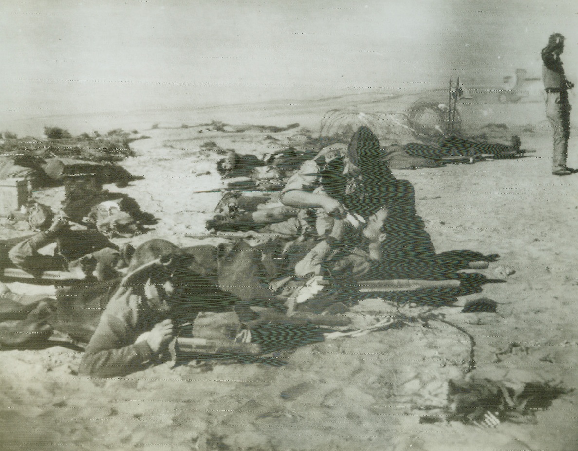 British Casualties in Desert War, 10/27/1942. Cairo—Wounded men of the Highland Division, the first British casualties in renewed warfare in the Western desert, are being tended by the Royal Army Medical Corps at an advanced field dressing station. In view of heavy fighting that has occurred in the past 48 hours, it is expected that casualties have been fairly heavy on both sides. Credit: ACME radiophoto.;