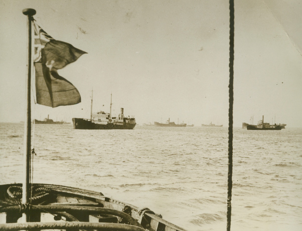 British Ships Gathering for Convoy Sailing, 11/23/1939. Somewhere in England—Merchant ships of all shapes and sizes gather at an assembly point for sailing in convoy under protection of British warships. Credit: ACME.;
