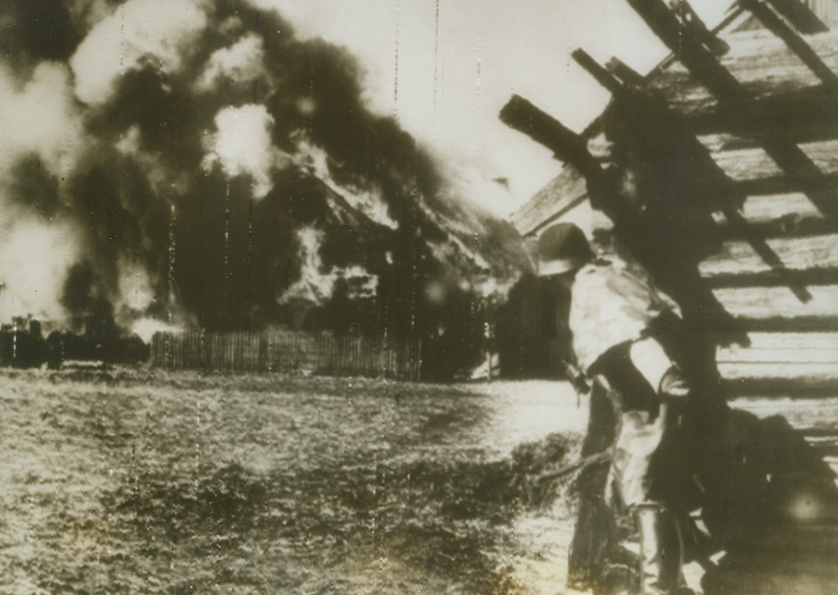 Axis Raid on Jugoslav Partisans, 5/19/1943. Jugoslavia – A German anti-partisan patrol explodes a munition depot after tracking down a partisan supply headquarters somewhere in Jugoslavia. Activities of these patriots have forced Hitler to keep a large contingent of troops in the occupied country. Photo received from a neutral source, was radioed from Stockholm to New York today (May 19). Credit: ACME Radiophoto;