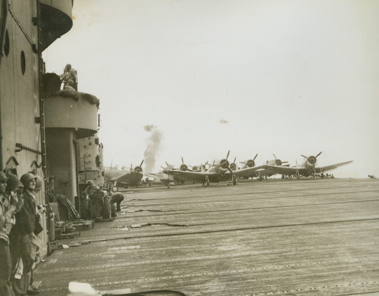 Another Zero Bites the Dust, 1/18/1944. At Sea – Ack-ack scored another hit when an attacking Jap zero missed its American target and was sent down to a watery grave.  Only a thin column of smoke in the distance is left of the enemy war bird, one of 63 downed by a carrier task force in the American assault on Rabaul on November 11, 1943. Credit line (Official U.S. Navy photo from ACME);