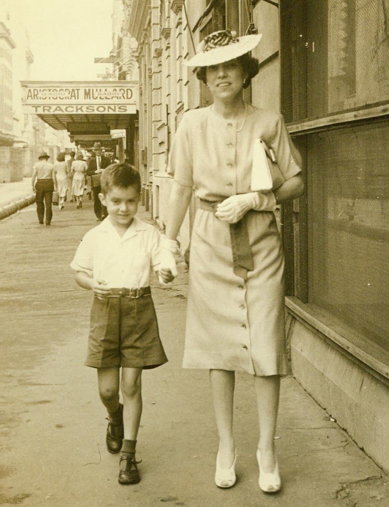 General's Wife and Son, 2/25/1944. Australia—Young Arthur MacArthur, son of America’s General Douglas MacArthur, accompanies his mother on a shopping tour in Australia where they are living. Holding tightly to Mrs. MacArthur’s hand, the boy has just celebrated his sixth birthday. 2/25/44;