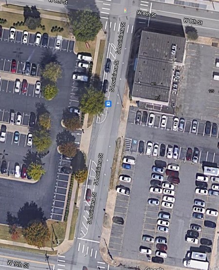 Note that, with a parking protected bike lane and one major parking lot access point midblock, that Louisiana St. between 8th and 9th Streets has only five parallel parking spots because of the no parking buffers that must be created in order for people driving to see people biking and visa versa. Kavanaugh blocks often have more than one property access point and high enough parking demand that this type of facility would not allow the street to meet current parking demands.