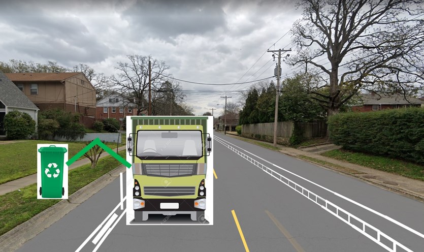 Little Rock's trash and recycle truck arms can extend over the physically protected bike lane to collect containers left on the curb.