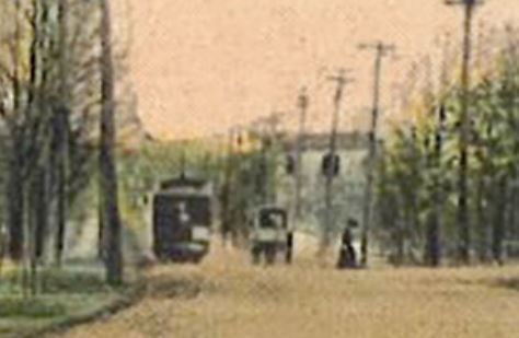 Zoomed in to show Prospect Ave.'s three street users, the trolley, a horse and buggy, and a pedestrian crossing the street.